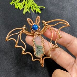 Handcrafted Copper Bat Pendant with Blue Accent